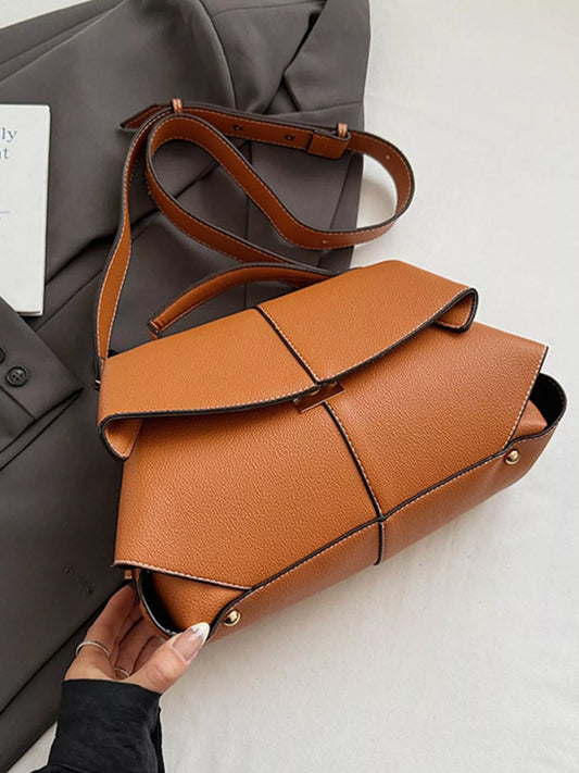 Geometric flap shoulder bag from Trendsi, stylish handbag with modern design and structured shape, perfect for everyday wear.