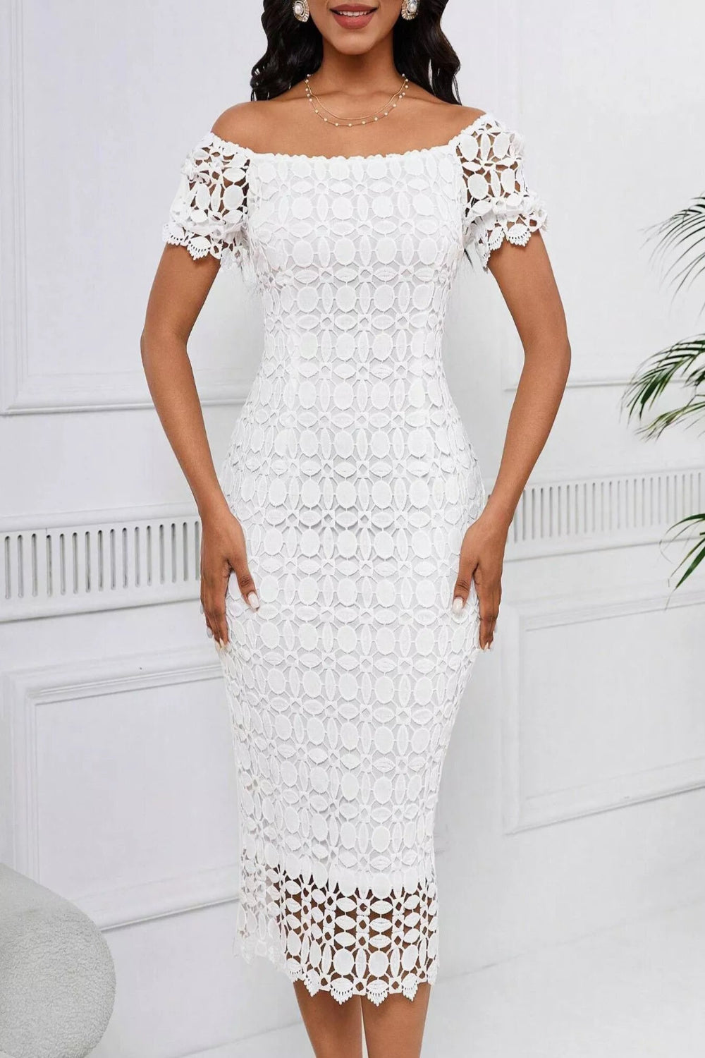 Lace short sleeve midi dress by Trendsi featuring a fitted bodice and flowing skirt, perfect for elegant occasions.