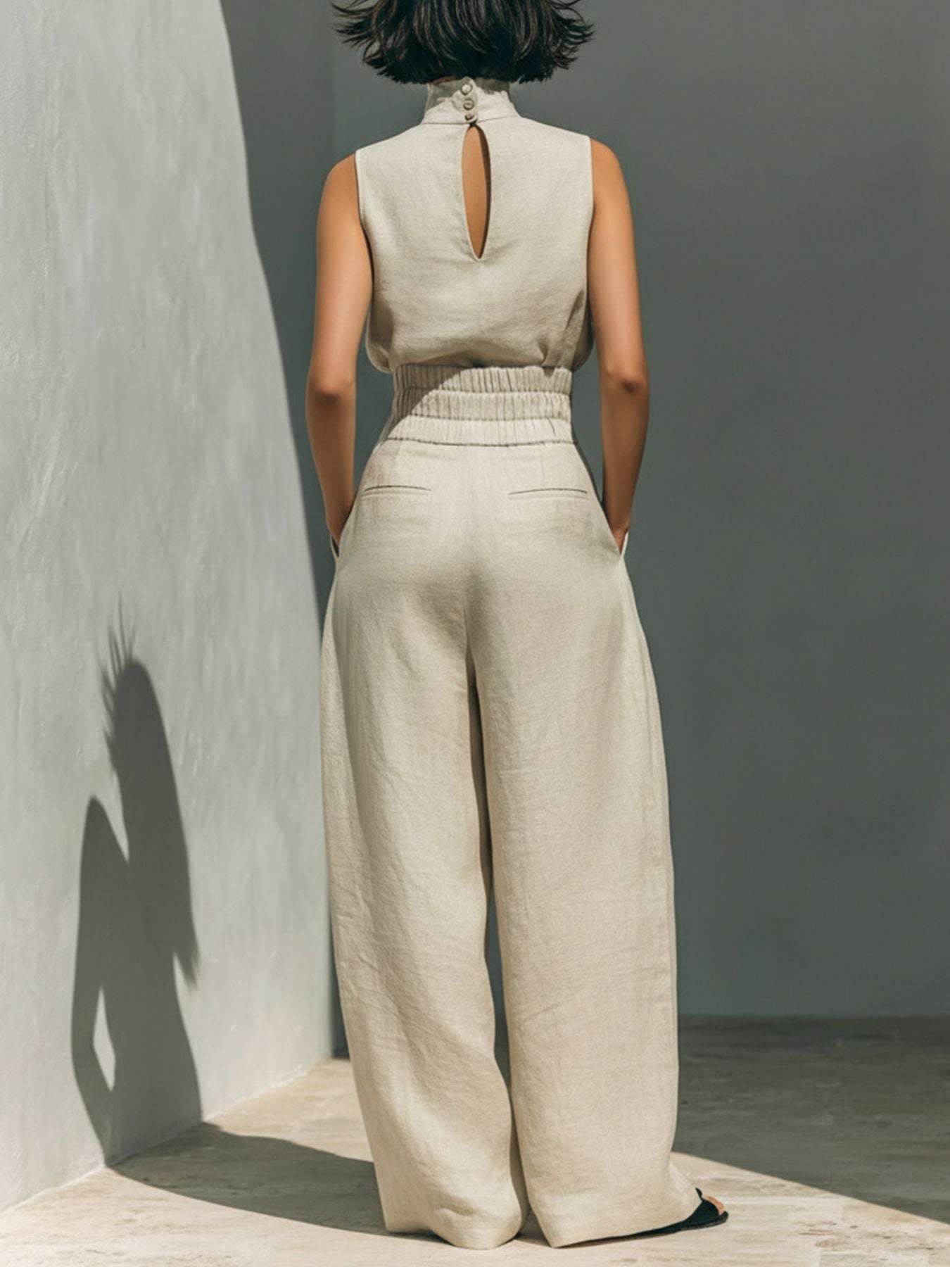 Sleeveless turtleneck top and matching pants set by Trendsi, stylish and comfortable outfit for casual or chic looks.