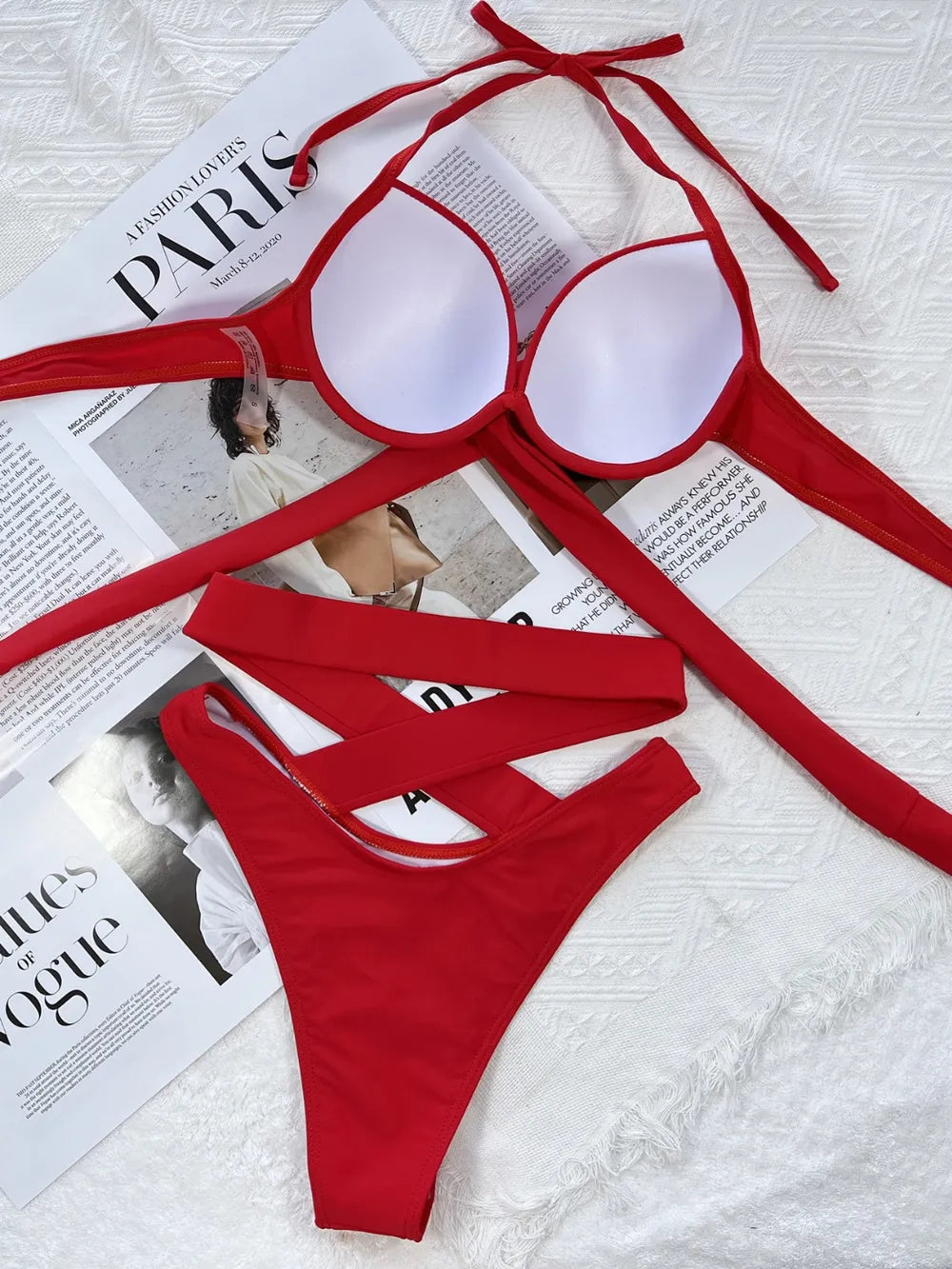 Crisscross halter neck bikini set by Trendsi featuring a stylish swimwear design with adjustable straps and vibrant colors.