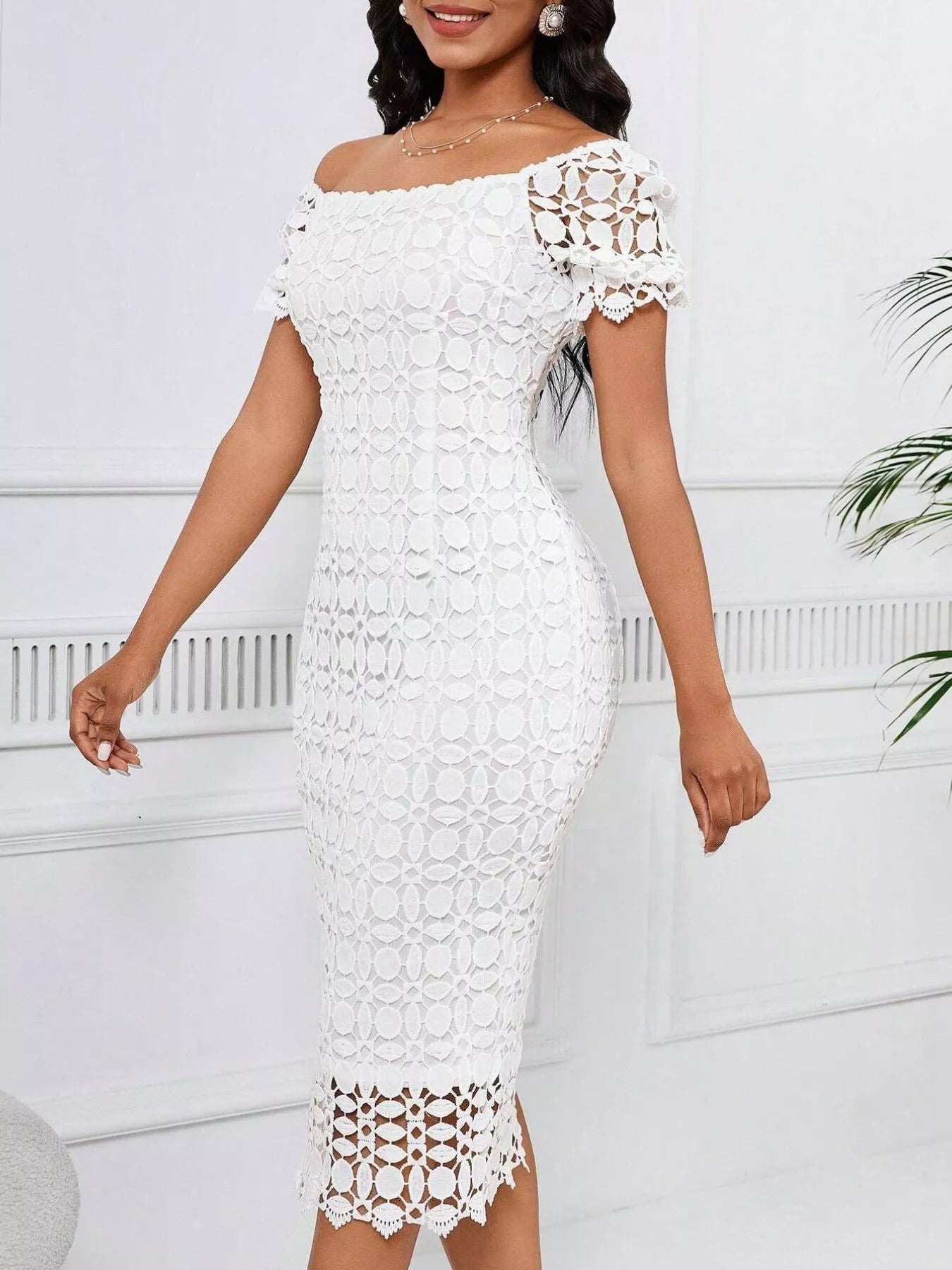 Lace short sleeve midi dress from Trendsi featuring intricate lace fabric, fitted waist, and classic midi length.