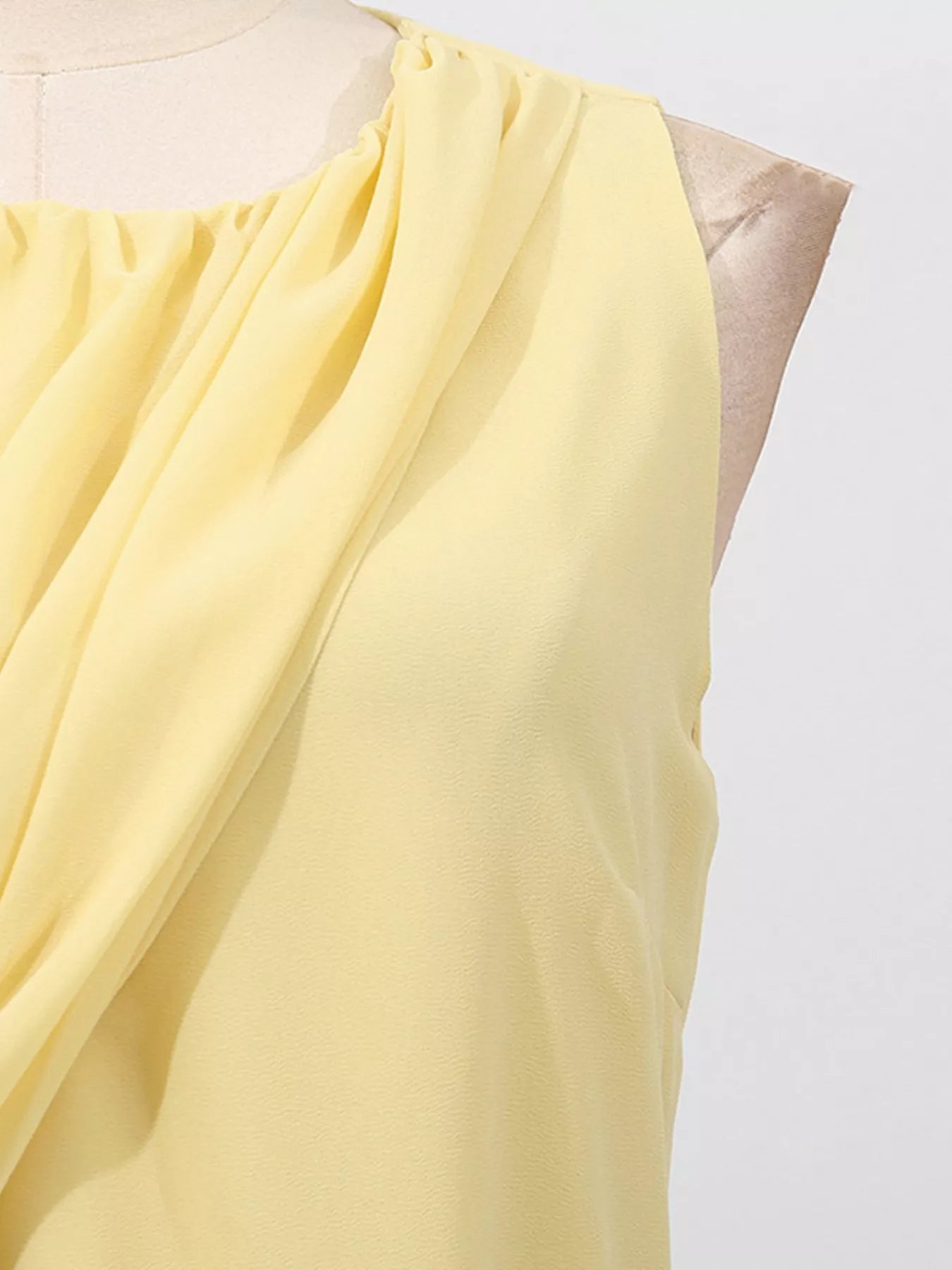 Yellow sleeveless ruched high-slit maxi dress by Trendsi featuring a flowy design and elegant high slit.