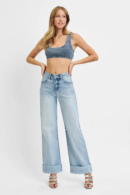 Wide cuffed high rise ankle jeans by Trendsi, made of denim, featuring a fitted waist, wide cuffs, and ankle-length design.