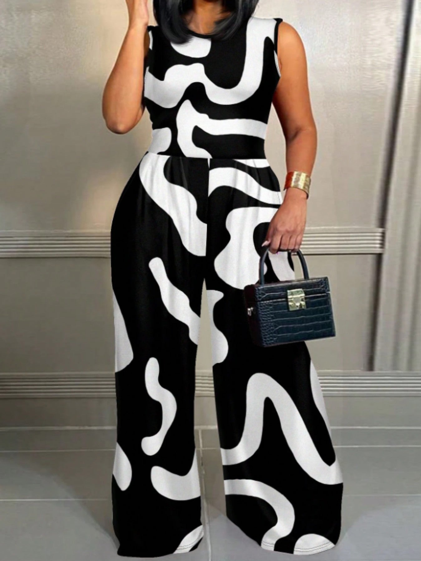Sleeveless Round Neck Flared Hem Jumpsuit – Elegant, Flowy & All-in-One Statement Look