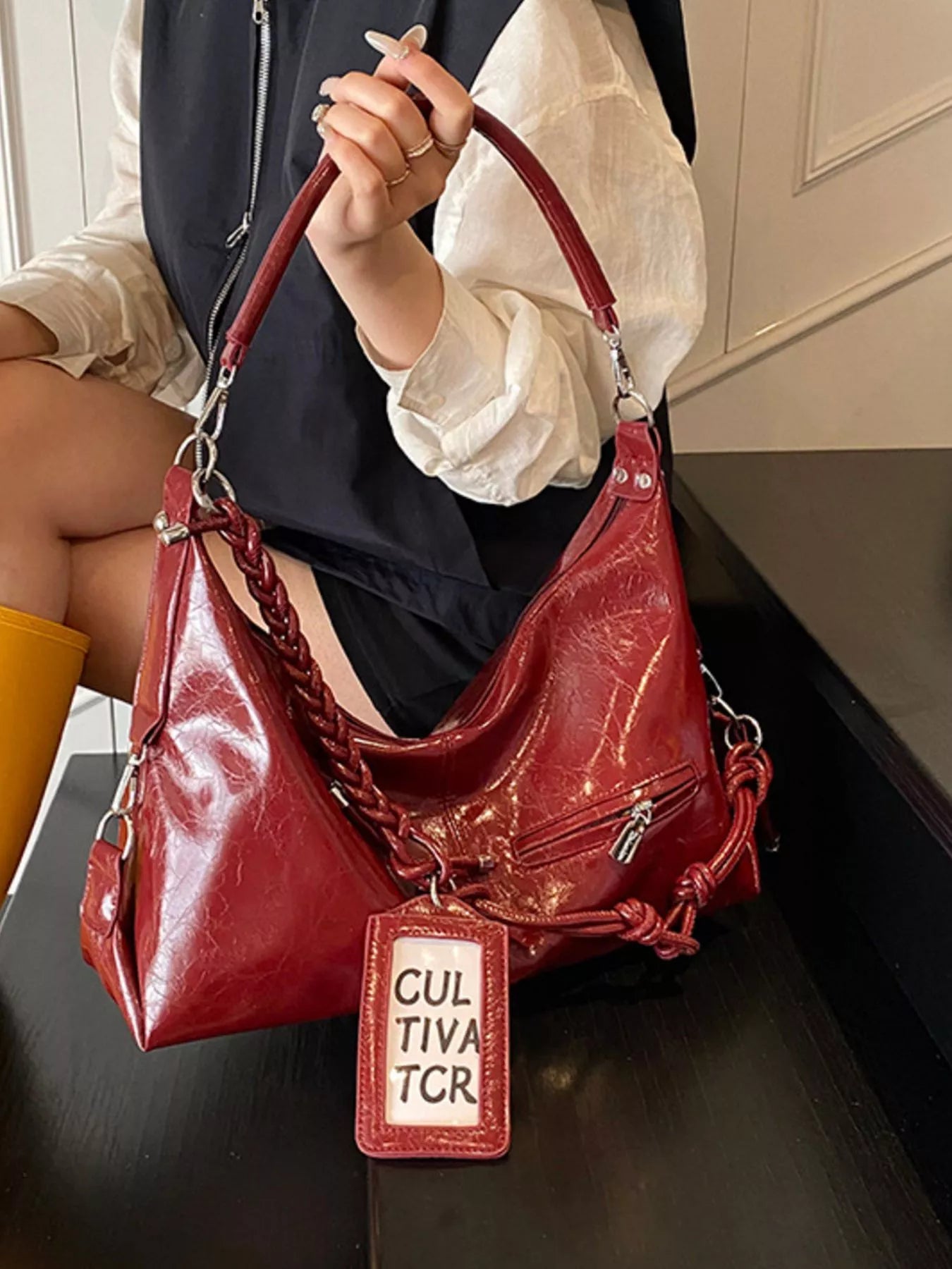 Vintage braided strap shoulder handbag with woven leather design, featuring a stylish and spacious Trendsi tote bag for everyday use.