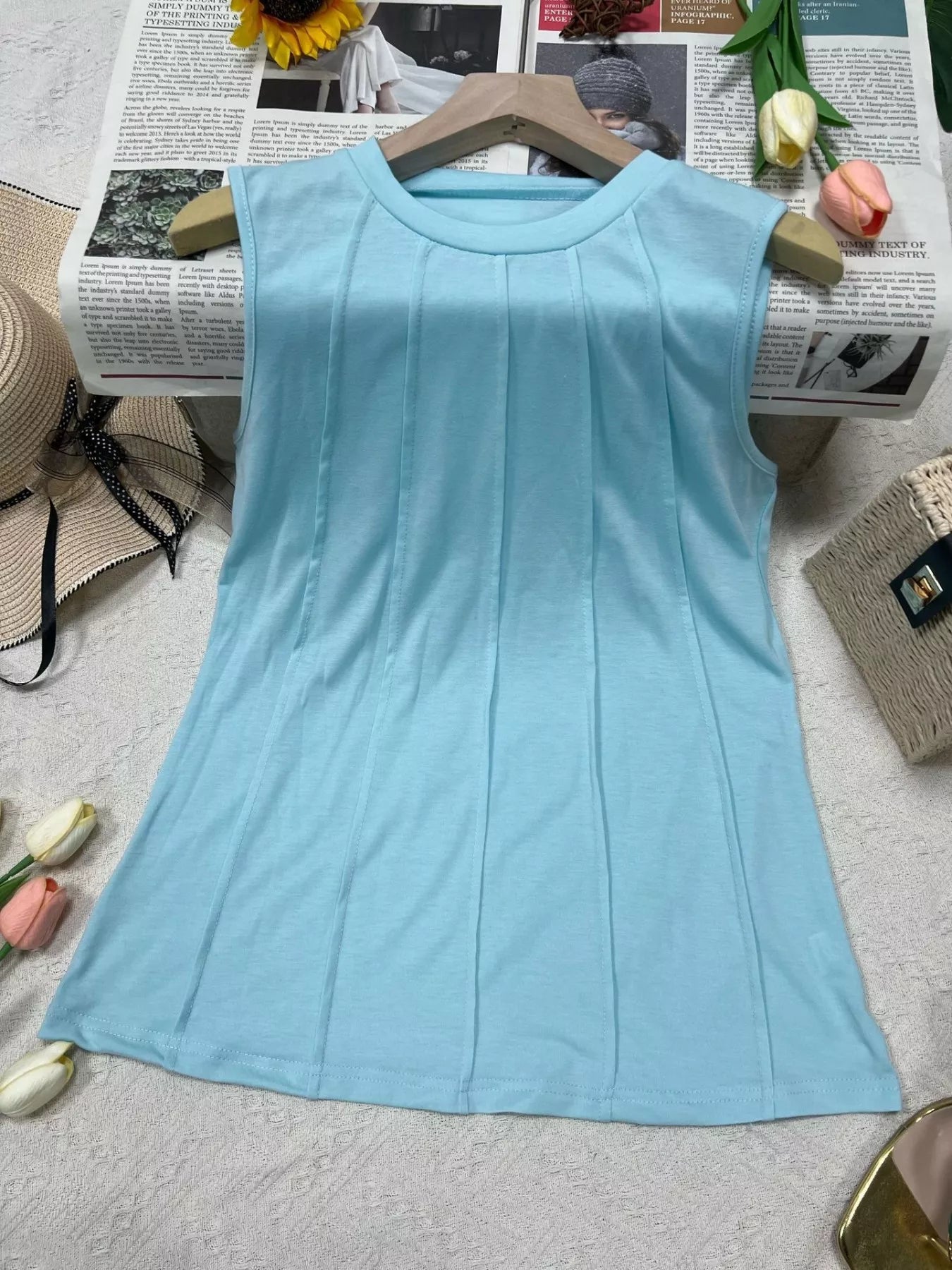 Wide ribbed tank top with detailed design, fitted sleeveless style, by Trendsi, perfect for casual summer wear.