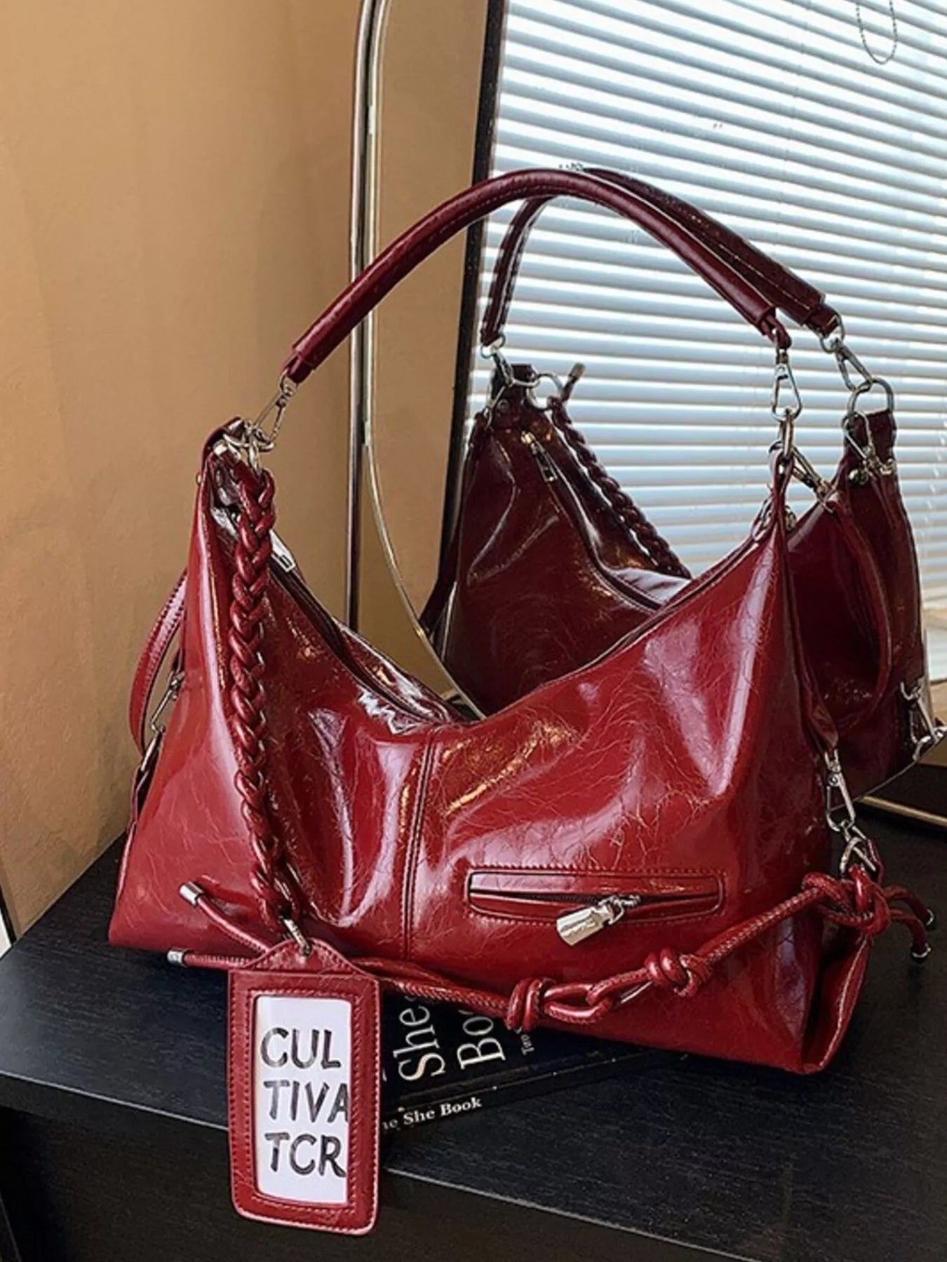 Vintage braided strap shoulder handbag with woven design, trendy and stylish, featuring a versatile shoulder strap for everyday use.