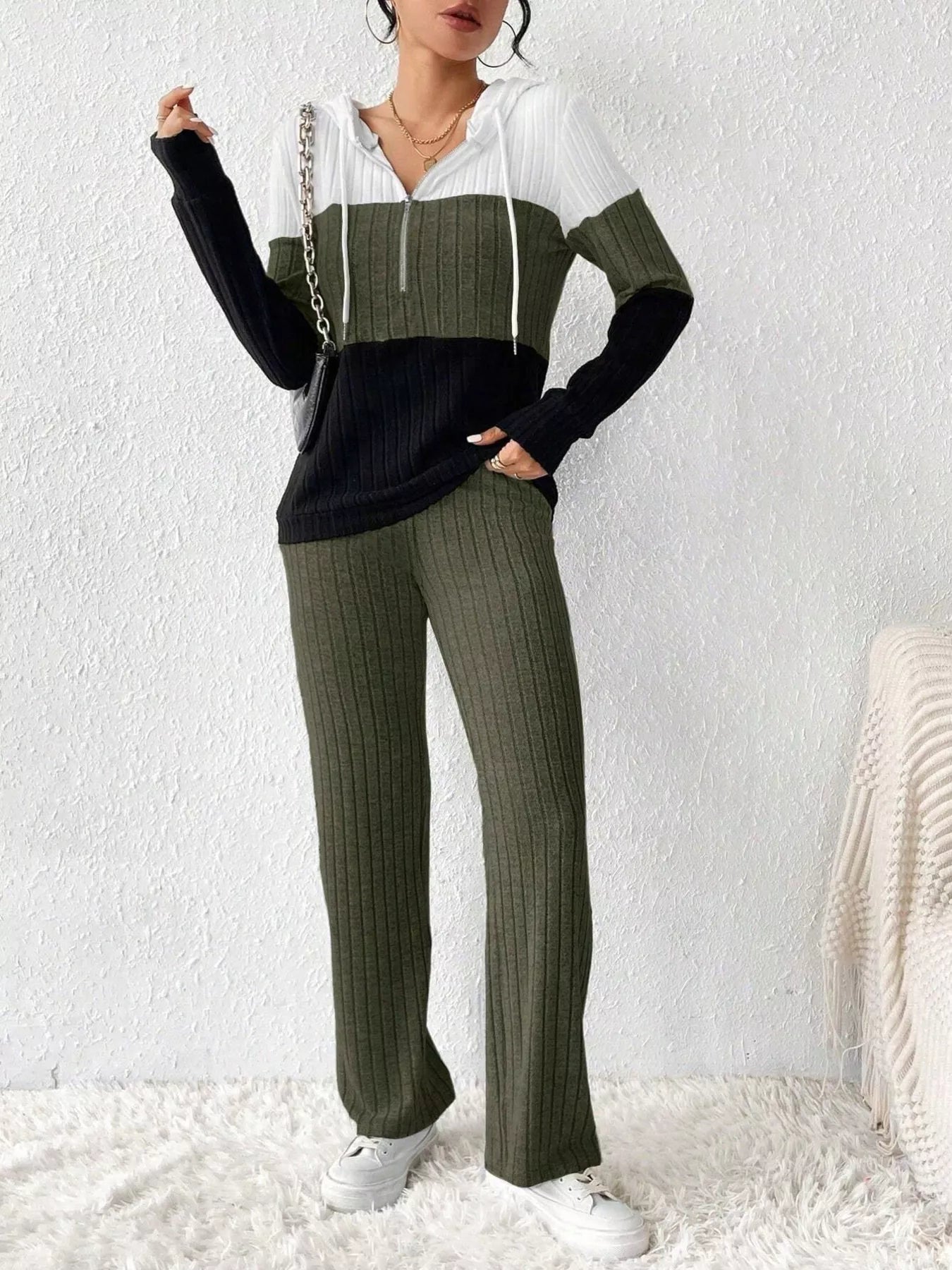 Color block half zip hooded top and pants set by Trendsi, featuring a stylish casual look with color blocking details.