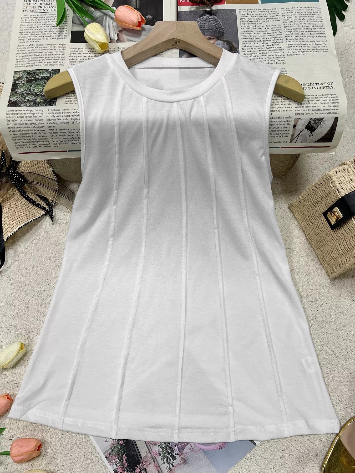 Wide ribbed detailed tank top from Trendsi, featuring a fitted sleeveless design and textured fabric, perfect for casual wear.
