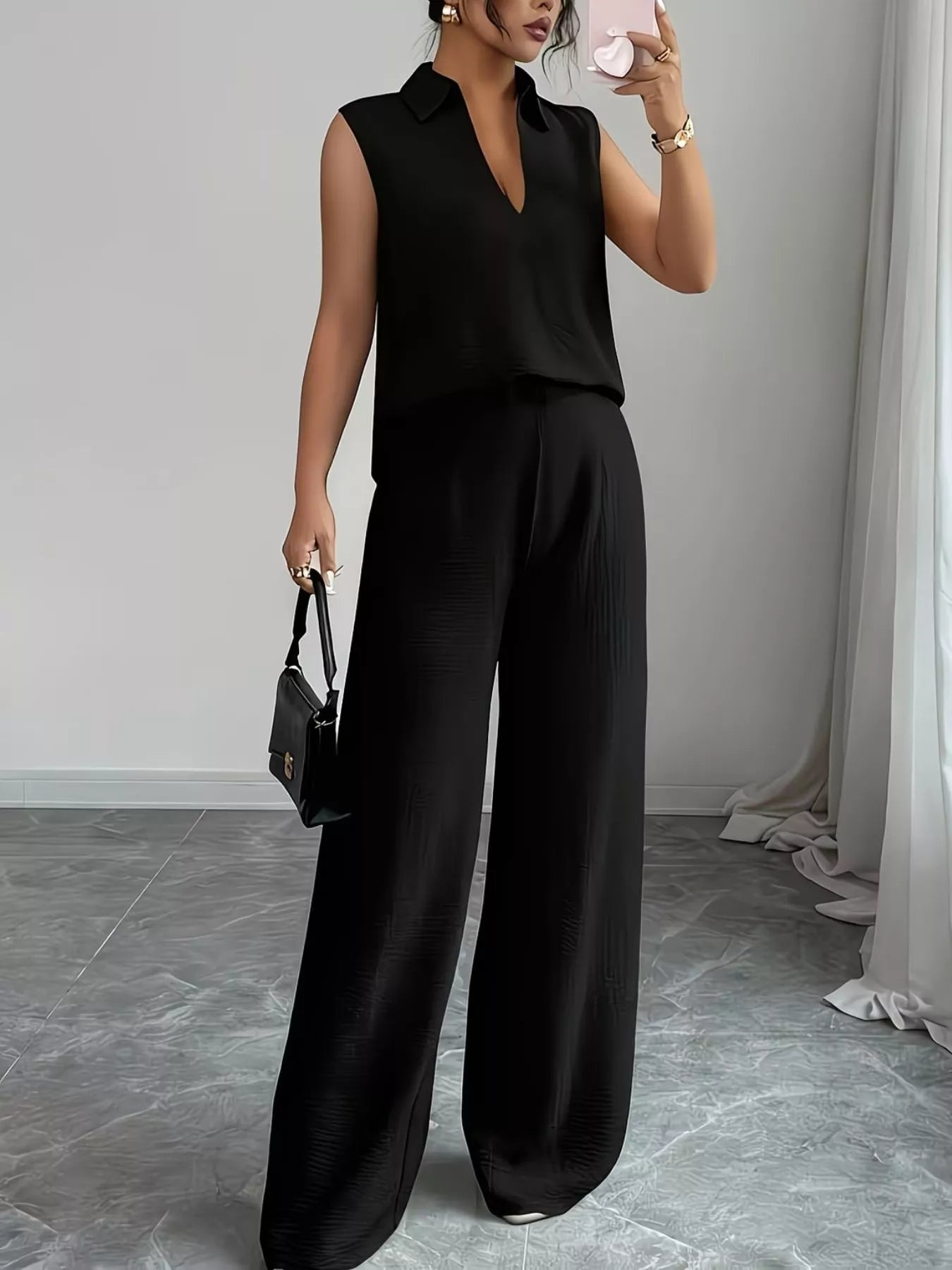 V-neck sleeveless top and wide-leg pants set by Trendsi, featuring a stylish, comfortable matching outfit in soft fabric.