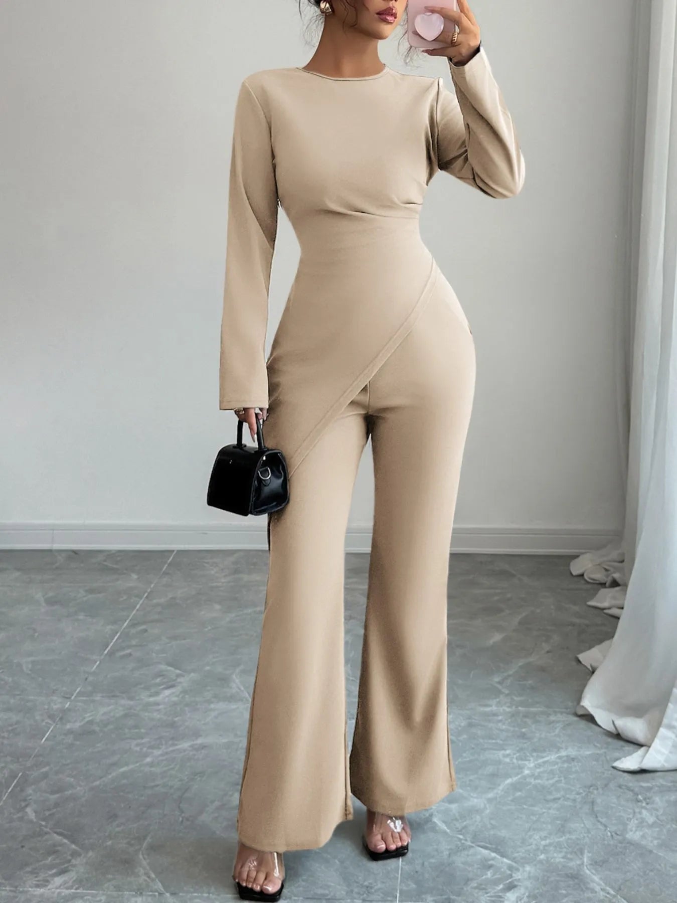 Asymmetric long sleeve top and pants set by Trendsi, stylish two-piece outfit with modern design and comfortable fit.