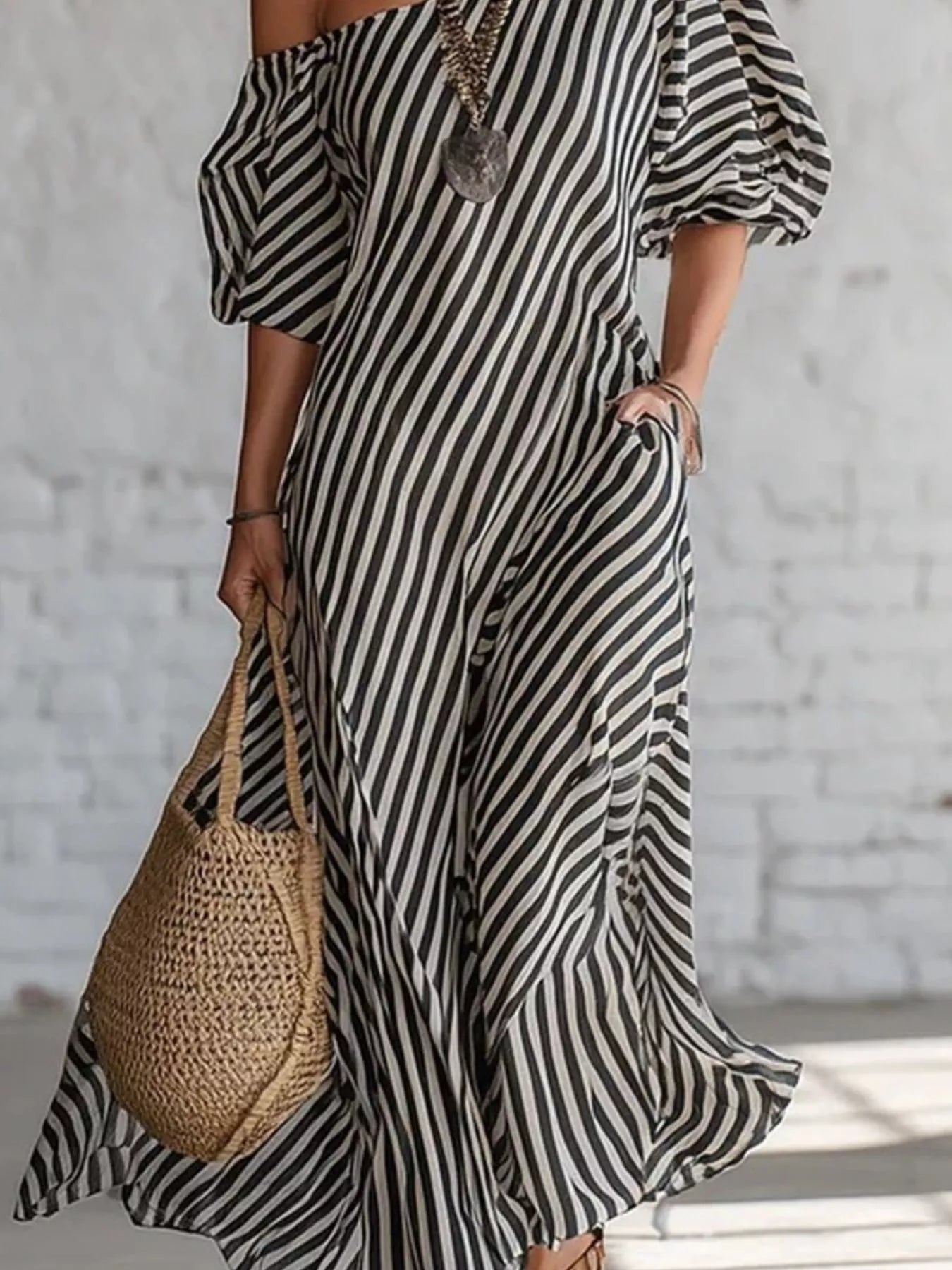 Striped one-shoulder maxi dress by Trendsi, flowing lightweight dress with bold horizontal stripes and elegant asymmetrical neckline.