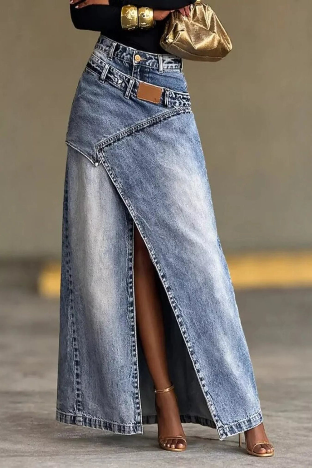 High-waisted slit denim skirt from Trendsi, styled with a casual fit and classic blue wash, suitable for everyday wear.