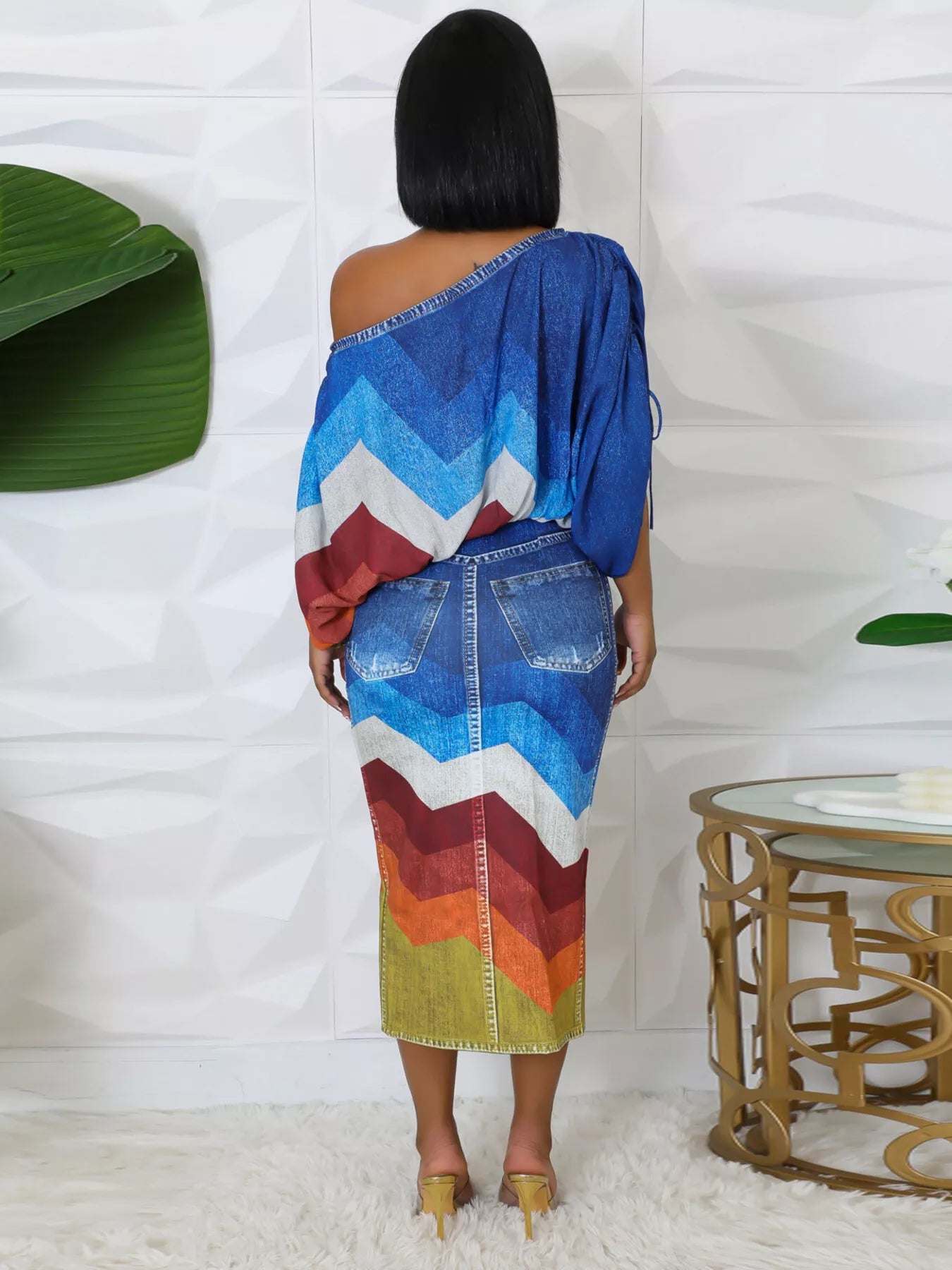 Blue one-shoulder top and slit skirt set by Trendsi, stylish coordinated outfit featuring a trendy design and flattering fit.
