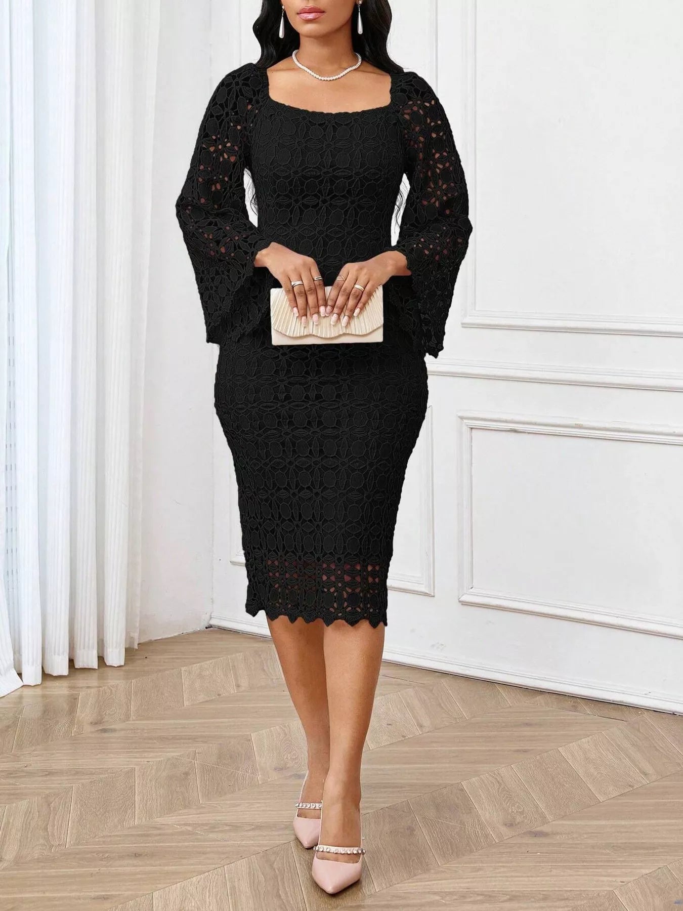 Lace square neck midi dress by Trendsi featuring long sleeves and a fitted silhouette, displayed on a hanger.